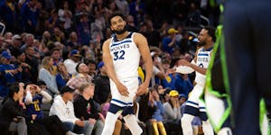 The Wolves’ Karl-Anthony Towns stunned Golden State fans and thrilled teammates including Mike Conley (10) after his game-winning three-pointer with
