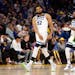 The Wolves’ Karl-Anthony Towns stunned Golden State fans and thrilled teammates including Mike Conley (10) after his game-winning three-pointer with