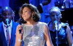 FILE - Singer Whitney Houston performs at the pre-Grammy gala & salute to industry icons with Clive Davis honoring David Geffen in Beverly Hills, Cali