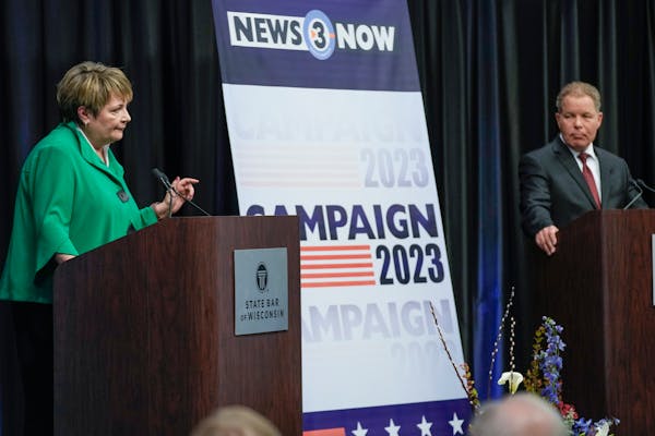 Wisconsin Supreme Court candidates Dan Kelly and Janet Protasiewicz during a debate March 21 in Madison. Kelly is backed by Republicans, Protasiewicz 