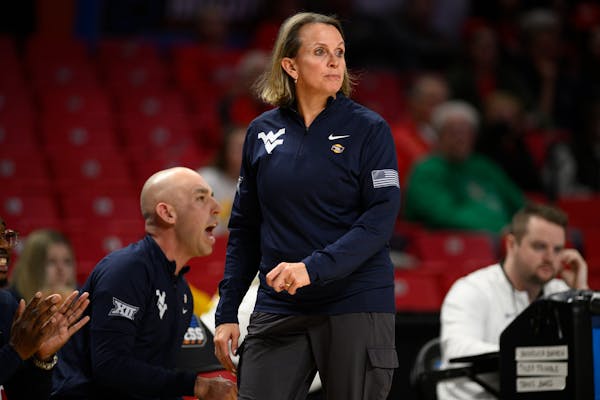 West Virginia head coach Dawn Plitzuweit in action in the first half of a first-round college basketball game in the NCAA Tournament against Arizona, 