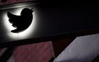 The Twitter logo is seen on the awning of the building that houses the Twitter office in New York, Wednesday, Oct. 26, 2022.