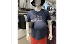 A screenshot of a Reddit post from four years ago shows a mannequin sporting TravisMathew’s “Dad Bod” T-shirt in an undisclosed location.