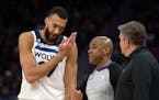 Minnesota Timberwolves center Rudy Gobert (27) disputes a flagrant foul call with referee Tre Maddox and head coach Chris Finch during the third quart