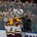 The Gophers celebrated Logan Cooley’s go-ahead goal against St. Cloud State in the Fargo Regional final on Saturday.