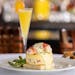 Indulge in Lobster Frittata with butter-poached lobster tails at the Capital Grille.
