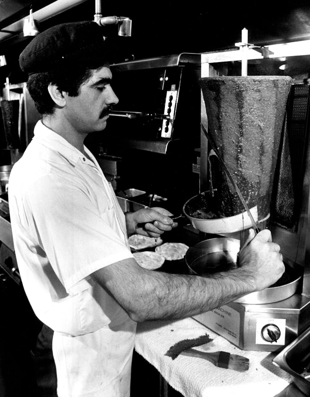 In 1985, co-owner Argyris Arambadjis sliced shawirma in the kitchen of It’s Greek to Me.