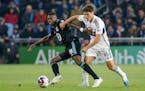 Minnesota United’s Joseph Rosales (8) and Vancouver’s Sebastian Berhalter (16) battled for the ball during Saturday’s 1-1 draw at Allianz Field.
