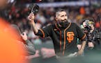 San Francisco Giants’ Sergio Romo tips his cap after the final relief appearance of his career during Bay Bridge Series against Oakland Athletics.