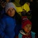 Migrants attend a vigil for the victims of a fire at an immigration detention center that killed dozens, in Ciudad Juarez, Mexico, Tuesday, March 28, 