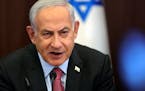 FILE - Israeli Prime Minister Benjamin Netanyahu attends a weekly cabinet meeting at the prime minister’s office in Jerusalem on March 19, 2023. Net