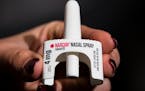 FILE - The overdose-reversal drug Narcan is displayed during training for employees of the Public Health Management Corporation (PHMC), Dec. 4, 2018, 