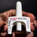 FILE - The overdose-reversal drug Narcan is displayed during training for employees of the Public Health Management Corporation (PHMC), Dec. 4, 2018, 