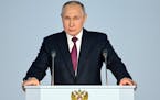Russian President Vladimir Putin gives his annual state of the nation address in Moscow, Russia, Tuesday, Feb. 21, 2023.