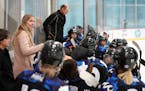 Minnesota Whitecaps coach Ronda Engelhardt talked with players during a hockey game in 2019. She is no longer with the team, the Whitecaps announced, 