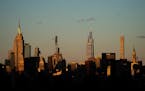 FILE - Light falls on the New York skyline during sunset, Nov. 20, 2022, in New York. In 2022, the county that encompasses Manhattan grew by more than