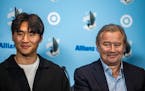 New potential star Sang Bin Jeong and Loons Head Coach Adrian Heath answer questions at a press conference in St. Paul, Minn., on Wednesday, March 22,