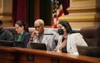 Minneapolis City Council member Aisha Chughtai, right, spoke just prior to the Minneapolis City Council voting 11-0 to approve an agreement that would