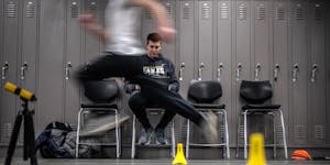 The lockers gave it away: Apple Valley boys track coach Zack Roble was timing his athletes in a school hallway. 