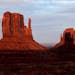 A sunset spectacle featuring two mitten-shaped rock formations crosses Monument Valley Tribal Park from the Visitors Center in Oljato-Monument Valley,