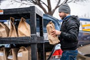 Amazon Prime Now driver Miguel Ramos of Richfield filled up his car in March with deliveries at the Amazon Prime Now hub in Minneapolis.