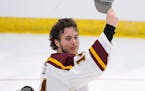Gophers captain Brock Faber celebrated the team’s 4-1 victory over St. Cloud State last Saturday in Fargo, which sent Minnesota back to the men’s 
