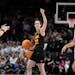 Iowa’s Caitlin Clark scored 41 points to lead the Hawkeyes to the national championship game.