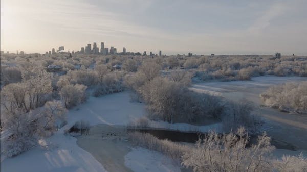 Minnesotans awake to snowy landscape