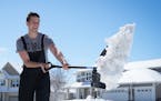 David King shoveled the driveway of his home in Maple Grove on Saturday. “I’m going to get more sun on my arms in two hours of shoveling than I go