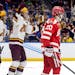 Gophers defenseman Mike Koster, right, celebrated after scoring in the Frozen Four semifinals against Boston University on April 6 in Tampa, Fla. He w