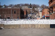 Stillwater has built a wall of sand that’s 2,000 feet long and 6 feet high to keep its downtown safe from the St. Croix River.