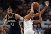 Wolves forward Kyle Anderson went to the basket on Sunday, when he also was the recipient of a punch from teammate Rudy Gobert.