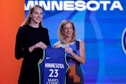 WNBA Commissioner Cathy Engelbert, right, greeted Dorka Juhász after the Lynx selected her 16th overall in the second round Monday.
