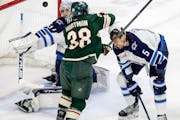 Ryan Hartman of the Wild got into a net-front dustup during Tuesday’s game against Winnipeg. 