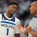 Wolves star Anthony Edwards talked with referee Rodney Mott after Edwards was called for a foul in the second half Sunday night in Denver.