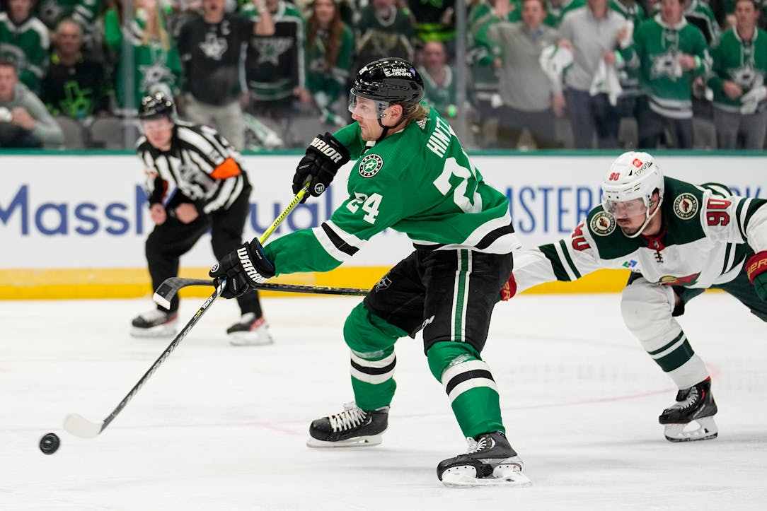Dallas Stars center Tyler Seguin controls the puck in front of Minnesota  Wild's Marcus Johansson (90) during Game 1 of an NHL hockey Stanley Cup  first-round playoff series, Tuesday, April 18, 2023