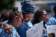 Mothers who lost their children to gun violence gathered in St. Paul at a march and rally in 2021.