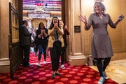 Sen. Erin May Quade, center, the transgender health care bill’s sponsor, and Rep. Leigh Finke, right, emerged elated from the Senate chambers on Fri