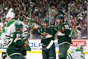 Wild right wing Mats Zuccarello celebrated his first-period goal with Kirill Kaprizov (97) and Ryan Hartman (38) in the first period of Game 3 at Xcel