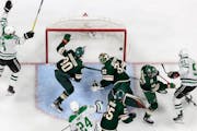 Tyler Seguin (91) of the Dallas Stars gets the puck past Minnesota Wild goalie Filip Gustavsson (32) for a goal in the second period during Round 1, G