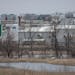 The HyLife Foods pork processing plant looms in the back ground on the outskirts of Windom, Minn., on Wednesday, April 19, 2023. HyLife Foods in Windo