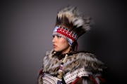 Snowy White, of Red Lake, stands for a portrait during “Northern Lights: A Native Nations Fashion Night.” White is wearing apparel by Golga Oscar,