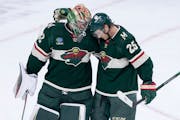 Wild goalie Filip Gustavsson, left, and defenseman Jonas Brodin, right, are two of eight Swedish players on the team’s roster.