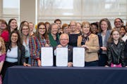 Gov. Tim Walz signed three progressive priorities of the session on Thursday.