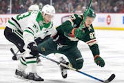The Wild’s Kirill Kaprizov, right, and Dallas’ Esa LIndell chased the puck during Game 4 on Sunday.
