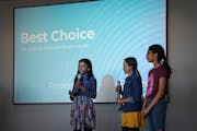 Grace Kaspar, left, Bhavagna Thumbeti, center, and Aadhya Sambhangi gave a presentation on the app they created to help reduce food waste. They were o