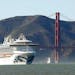 The Grand Princess cruise ship passes the Golden Gate Bridge as it arrives in San Francisco from Hawaii.