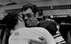 Joe Kapp hugged teammate Roy Winston during the Vikings’ heyday, part of which Kapp quarterbacked all the way to the Super Bowl.