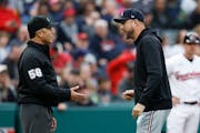 Twins manager Rocco Baldelli (arguing with umpire Dan Iassogna after being ejected against Cleveland on Saturday) doesn’t call a team meeting every 