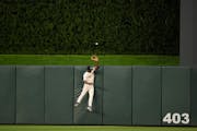 Twins center fielder Michael A. Taylor couldn’t quite get high enough to rob San Diego’s Juan Soto of a seventh-inning homer.